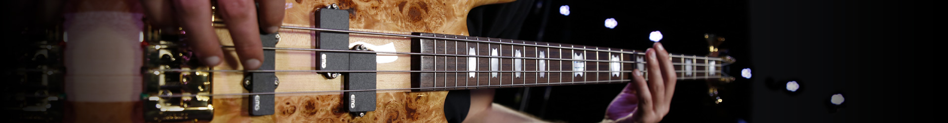 hands playing Spector bass