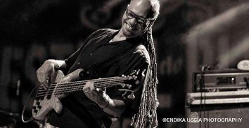 Lenny Bradford playing bass in concert