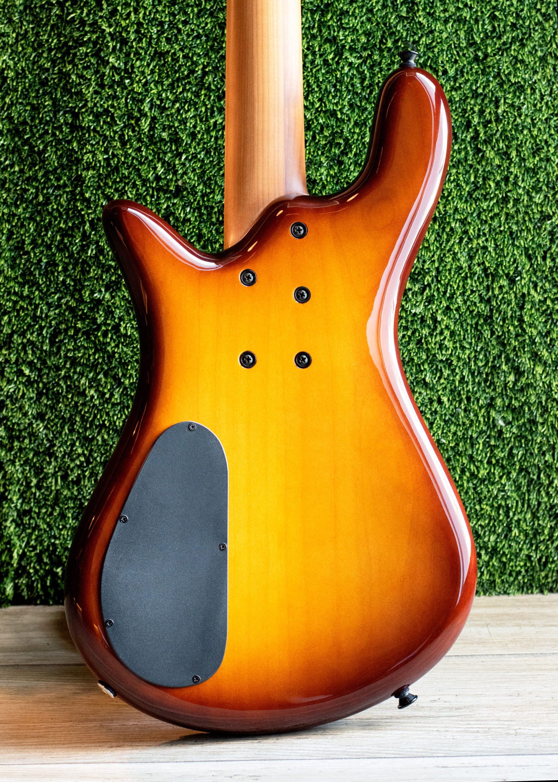 back of orange burst bass