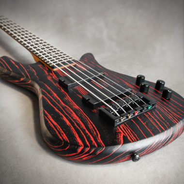 body of red and black Spector bass