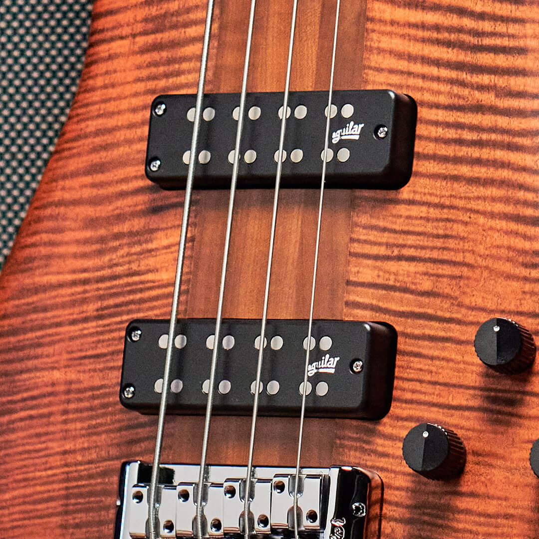 close up of aguilar super pickups on Euro RST bass guitar in Sienna Stain finish