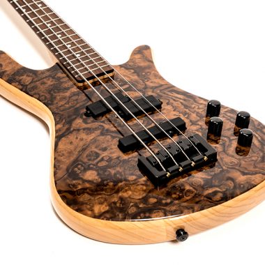 closeup of body of tan and brown Spector Legend4 cls electric bass