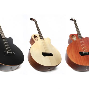 three different colors of Spector Timbre acoustic-electric basses lying side by side
